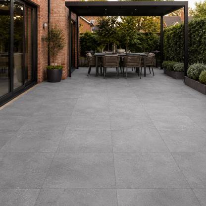 Materia Grafito 60x60 outdoor porcelain tiles installed on a UK garden dining patio