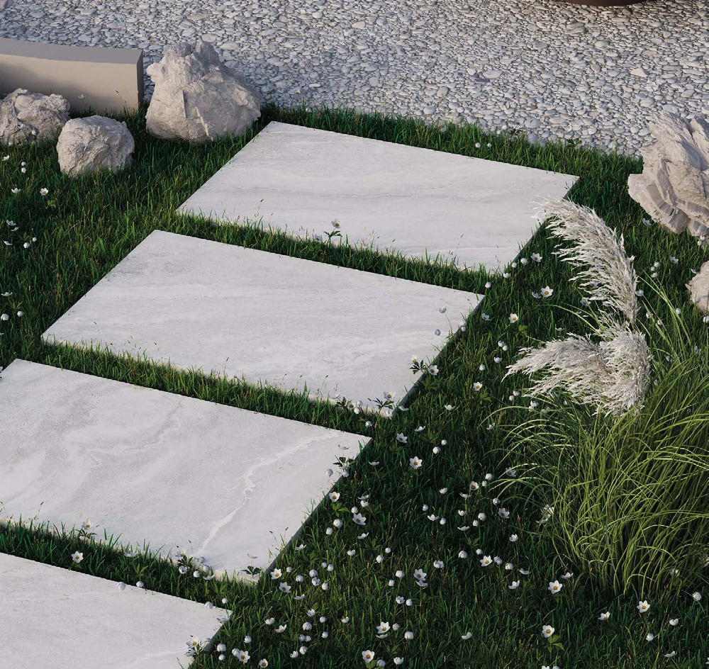 Nord Stone Ice 60x90 outdoor porcelain tiles in a garden setting