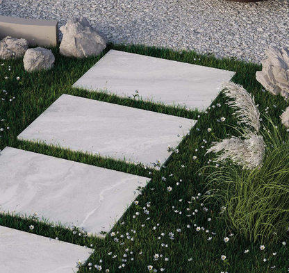 Nord Stone Ice 60x90 outdoor porcelain tiles in a garden setting