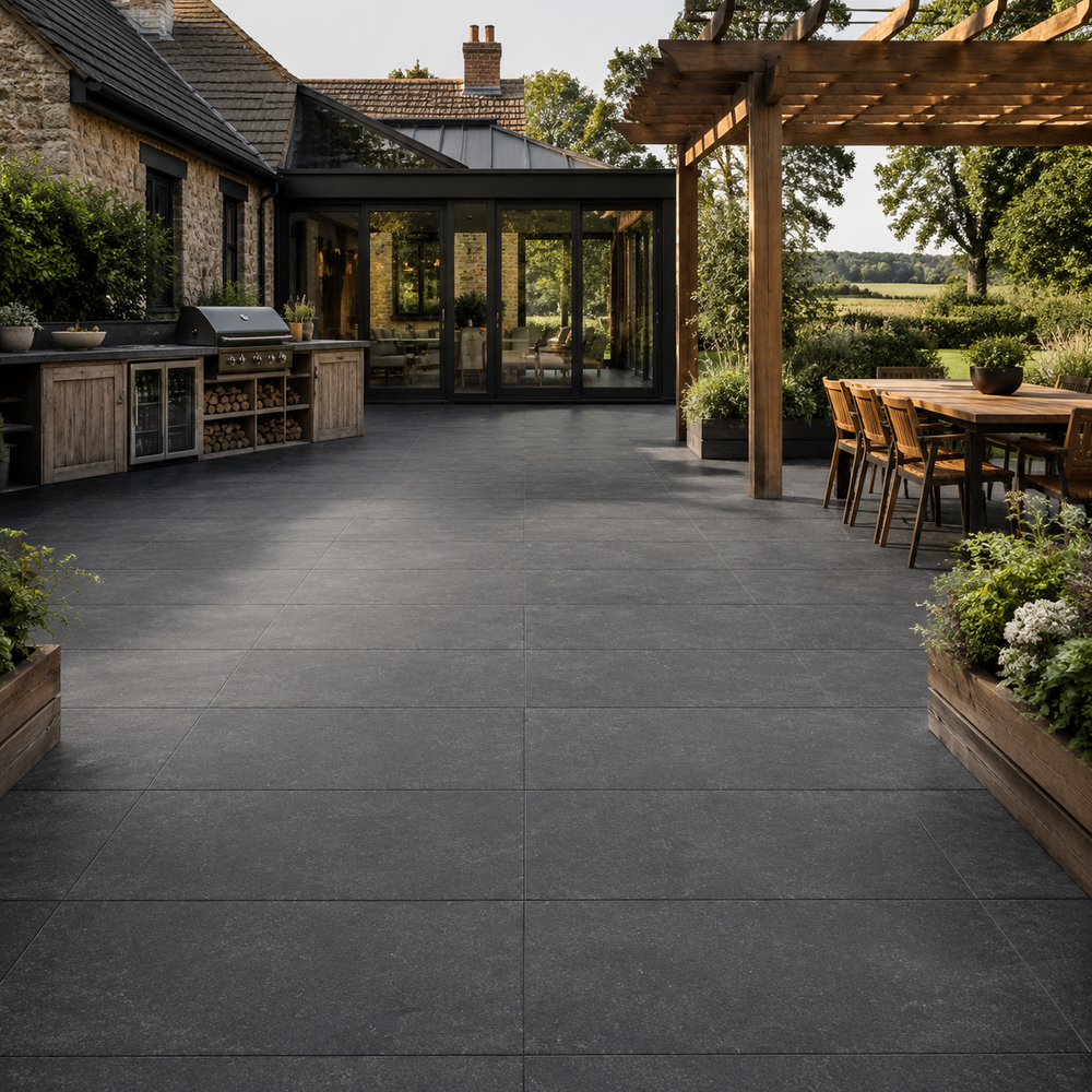 Raven Black 60x120 outdoor porcelain tiles in a modern UK courtyard