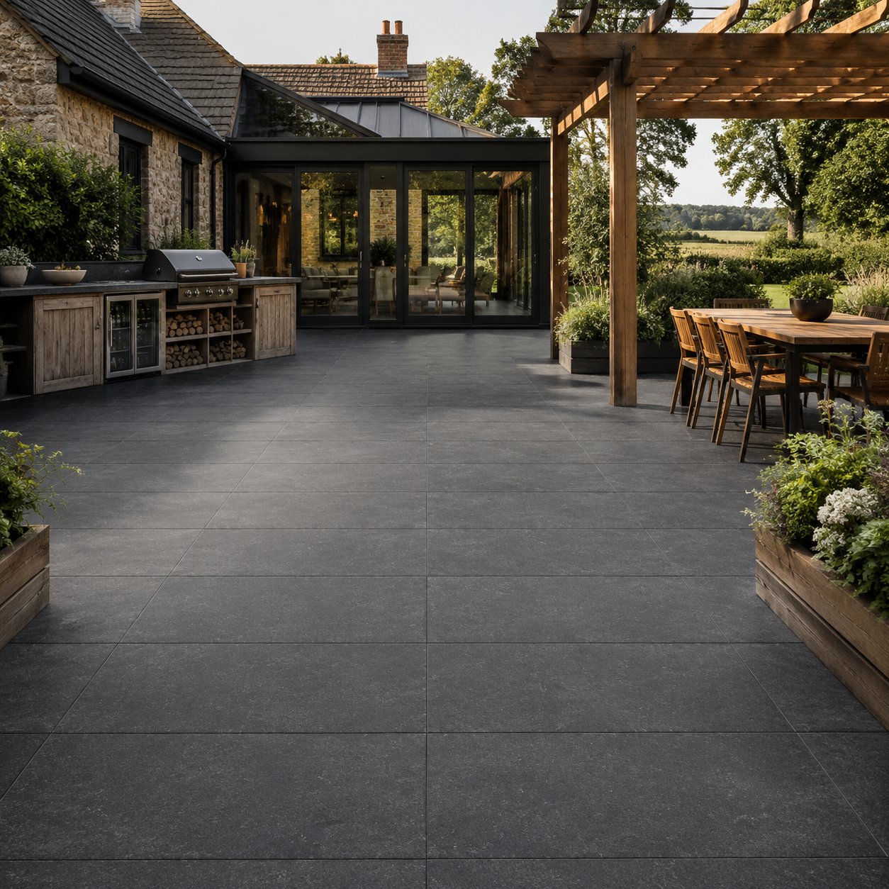 Raven Black 60x120 outdoor porcelain tiles in a modern UK courtyard