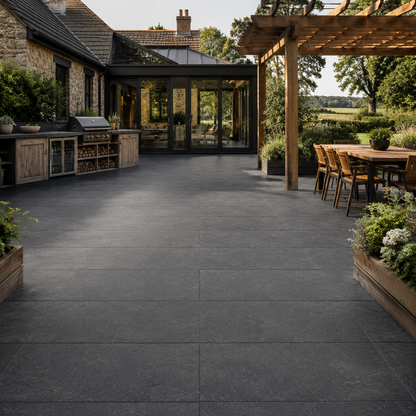 Raven Black 60x120 outdoor porcelain tiles in a modern UK courtyard